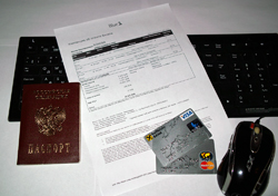 Паспорт, кредитная карта и компьютер - необходимые вещи для покупки электронного билета